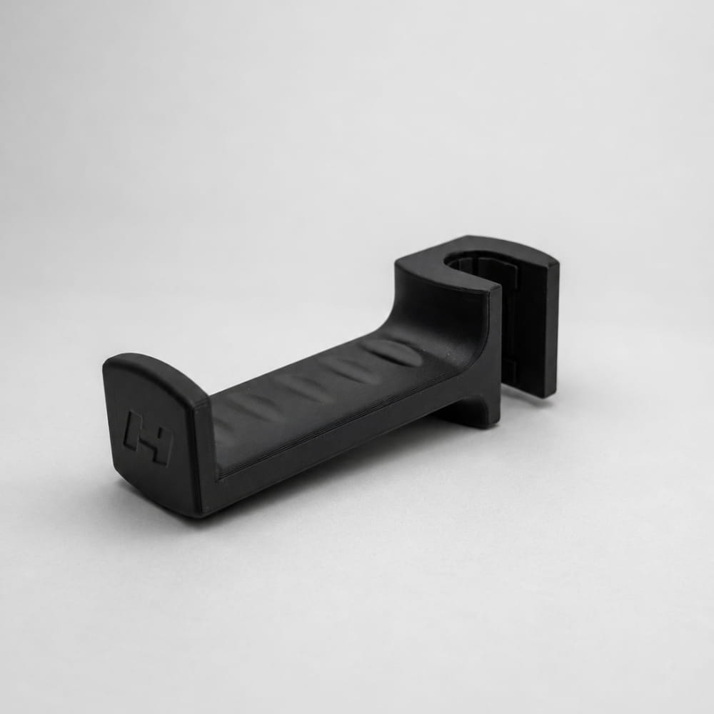 Black metal bracket on a light gray background