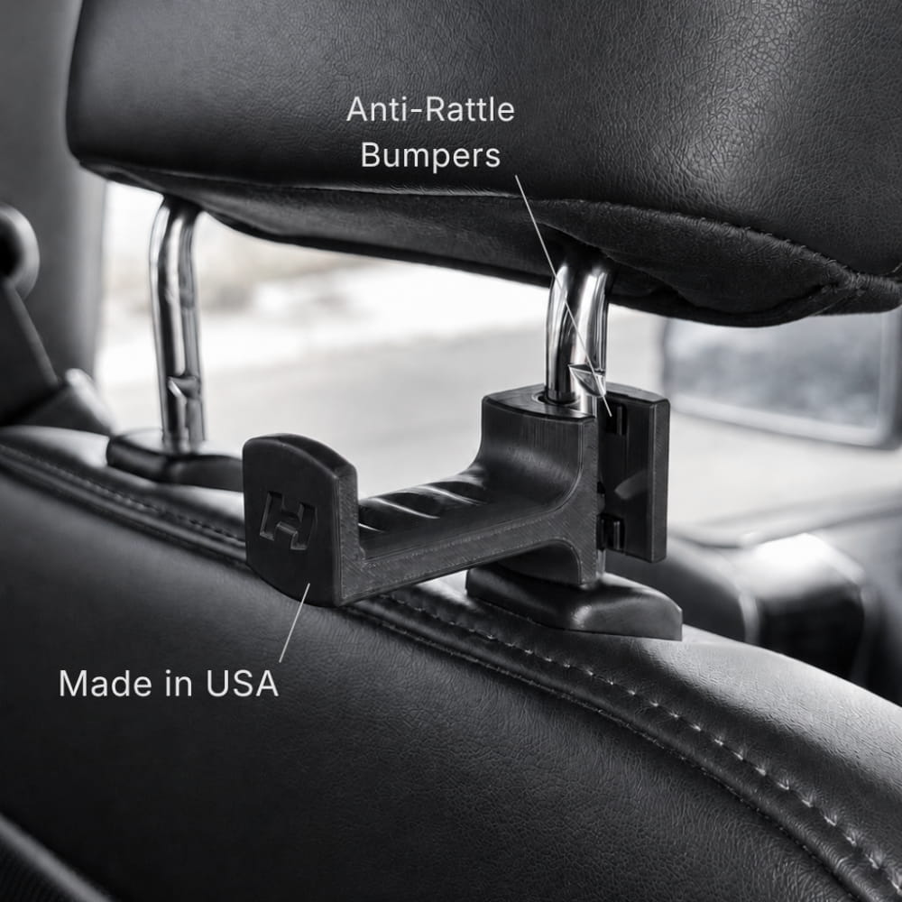 Car headrest with anti-rattle bumpers and 'Made in USA' label